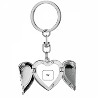 Символ на клавиатурата W Art Deco Fashion Heart Angel Wing Key Chain притежава